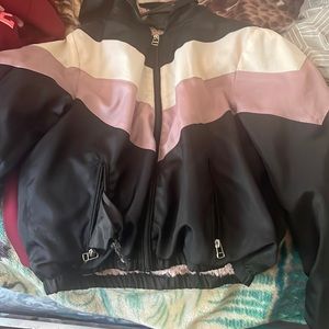 DELIA*s girls jacket, the colors are white, pink nd black wit pink fur